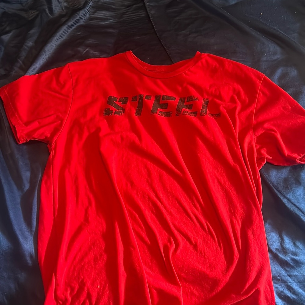 Red steel workout shirt, worn twice. New no stains or odors.